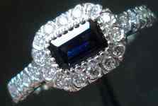 SOLD.... Natural Sapphire Halo Ring: .70 Emerald Cut Sapphire R2179