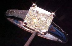 SOLD.....Ring: .55carat Natural Faint Yellow Radiant GIA Report R1051