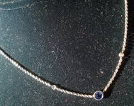 SOLD.....Sapphire and Diamond Necklace: Bezel set .44ct Sapphire  SO2573