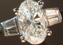 SOLD.....Three Stone Diamond Ring: 1.17ct Oval GIA H/SI2 in Baguette ring 18kt Yellow Gold R3044