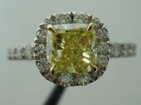 SOLD....Halo Diamond Ring: 1.02ct Fancy Yellow Cushion SI1 GIA Platinum and 18K Yellow Gold R3455