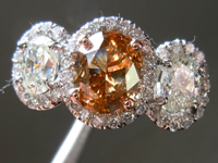 SOLD....Three Stone Ring: 1.39ct Fancy Orange Brown Oval Shape Diamond GIA Platinum Halo Ring R3605