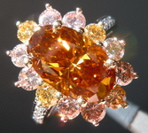 SOLD.....Multi Color Diamond Ring: 3.03 Fancy Deep Brown Orange Oval surrounded by Pink and Yellow Diamonds R4397