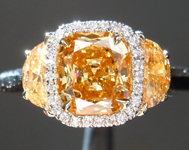 SOLD...Orange Diamond Ring: .78ct Fancy Vivid Yellow-Orange I1 Cushion Cut GIA Halo Three Stone R4943