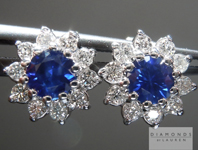SOLD.... Sapphire Earrings: .55cts Blue Round Brilliant Sapphires and Diamond Halo Earrings R5789