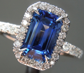 SOLD.........Sapphire Ring: 1.97ct Blue Emerald Cut Sapphire and Diamond Halo Ring R5753