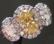 SOLD...Yellow Diamond Ring: .95ct Fancy Yellow VVS2 Oval Shape Three Stone Diamond Halo Ring GIA R6110