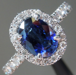 SOLD........Blue Sapphire Ring: 1.31ct Blue Oval Shape Sapphire and Diamond Halo Ring R7028