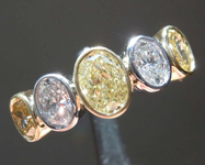 SOLD... 1.46ctw Yellow and Colorless Oval Diamond Ring R8189