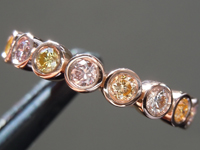 SOLD...0.65ctw Fancy Color Round Brilliant Diamond Ring R9965